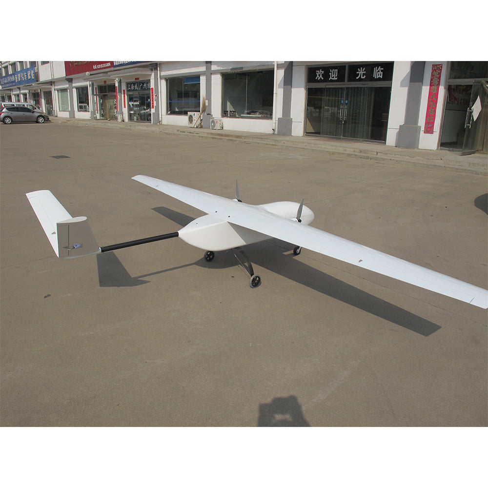 White fixed-wing drone for mapping and surveying on pavement