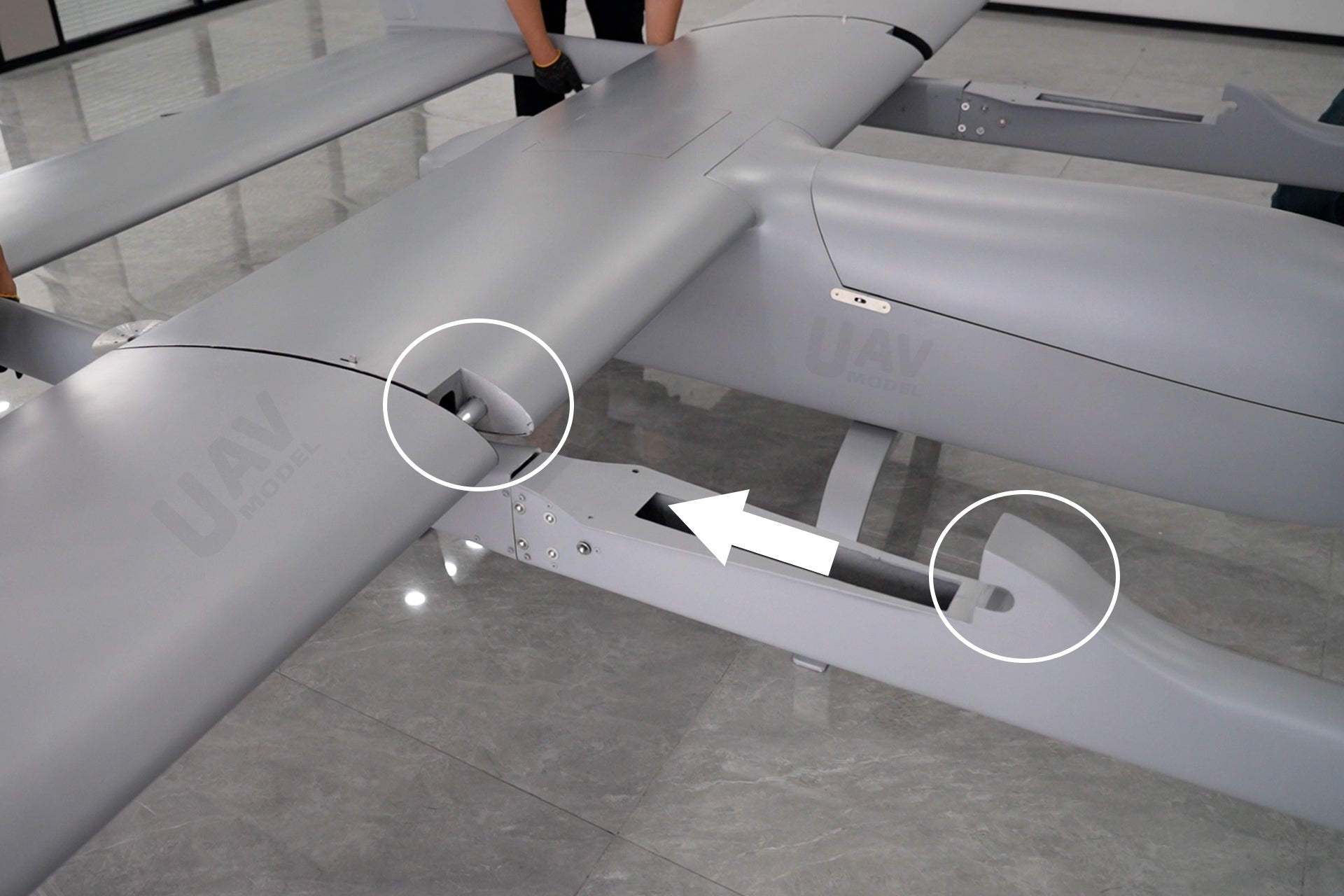 Skyeye Wingspan 6000MM VTOL UAV industrial drone in assembly, showcasing carbon fiber airframe and connection points.