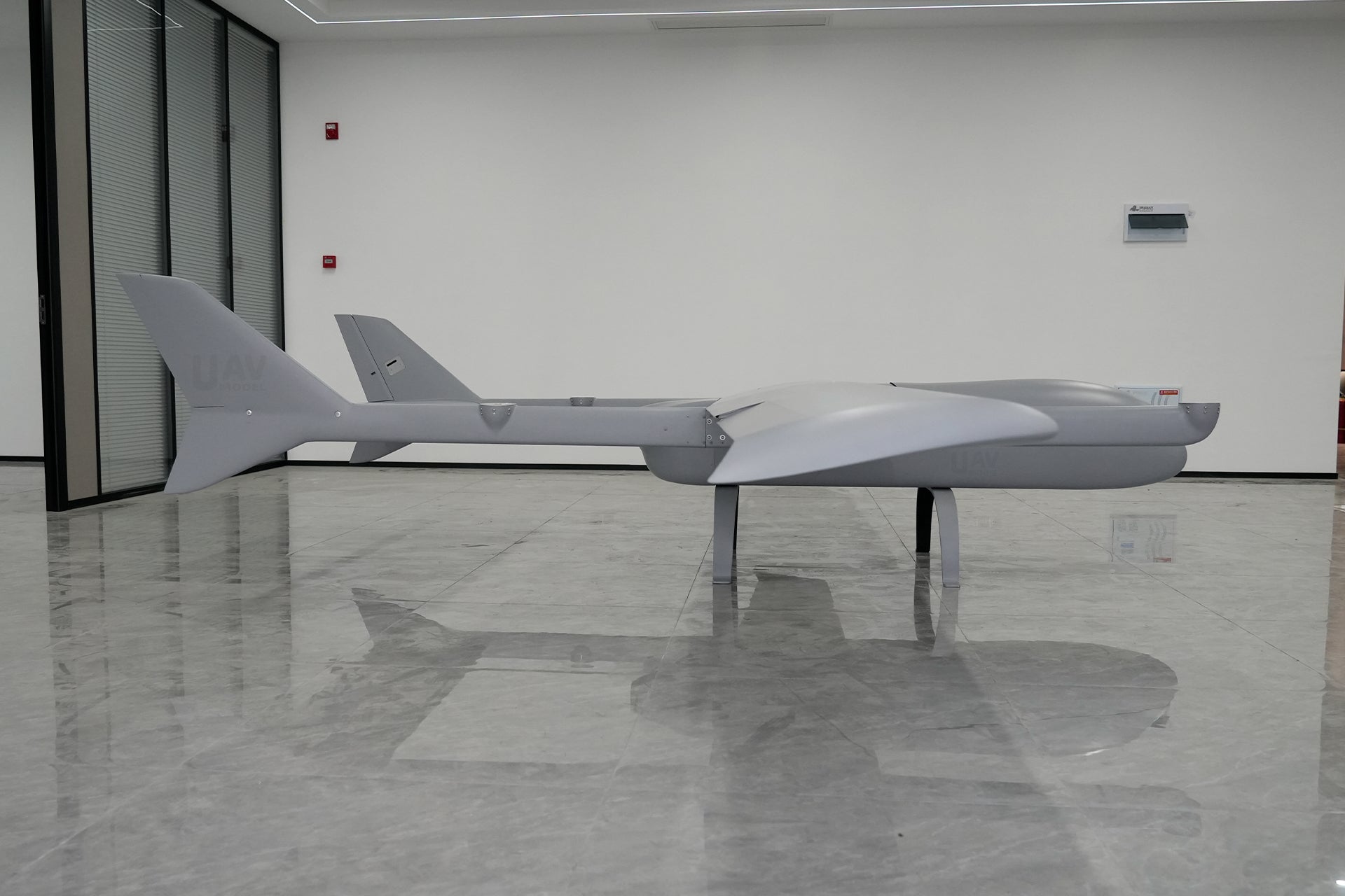 Skyeye Wingspan 6000MM VTOL UAV drone on display in a modern showroom.